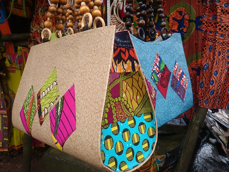 Diverse african clothing and adornment items showing in the under-tree shop at the Aburi Botanical Gardens in Aburi, Eastern Region, Ghana